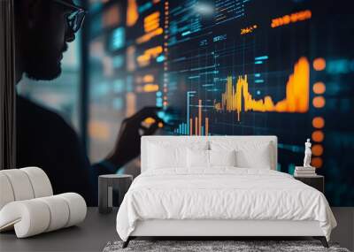 A professional analyzing data on a digital screen with graphs and statistics. Wall mural