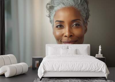  Natural beauty portrait of serene and elegant mature African woman with grey hair. Female slightly smiling. Light background studio shot. Natural female beauty and fascinating aging concept. Wall mural