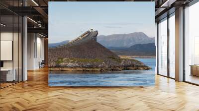 Atlantic Ocean Road with a famous Storseisundet Bridge. Picturesque northern Norway nature landscape and modern highway construction masterpiece union sunset view. Atlanterhavsvegen, Norway. Wall mural