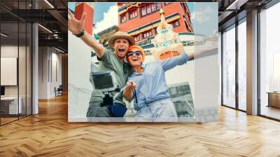 Happy couple take a self photo on the tibetian sight background Wall mural