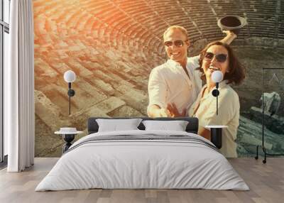 Happy young couple take self photo in their vacation Wall mural