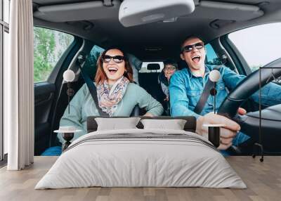 Singing family in car Wall mural