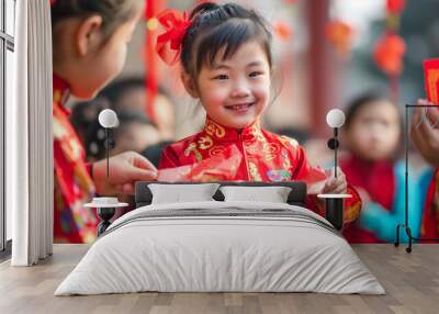 Chinese new year children receiving red envelopes Wall mural