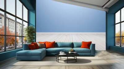 Empty interior light blue room with wooden floor, For display of Wall mural