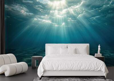 Fascinating sunlight beneath the surface of the ocean Wall mural