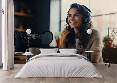 Young ethnic woman recording radio podcast - Millennial female content creator working from home studio - Creative people and freelancer lifestyle concept Wall mural