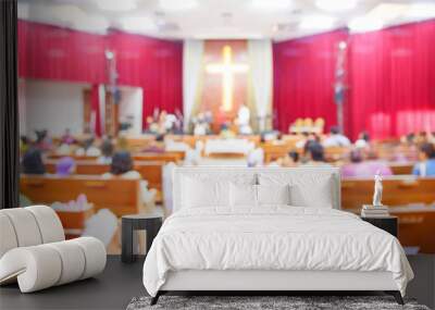 Blurred interior of church with many people Wall mural