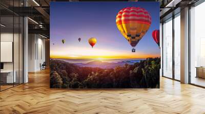 Colorful hot air balloons flying over mountain at Dot Inthanon in Chiang Mai, Thailand Wall mural