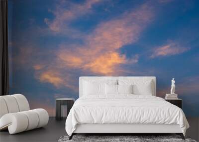 Dramatic cloudy sky during sunset, Texture of bright evening sky in twilight time background Wall mural