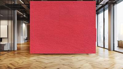 Bright rough plastered surface. Living coral colored. Backgrounds and textures Wall mural