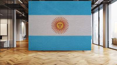 National emblem of Argentina. Flag of Argentina on close up. White and blue flag with sun Wall mural