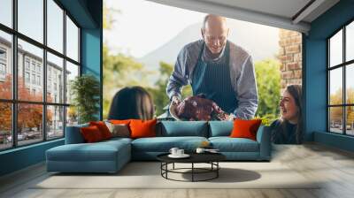 Thanksgiving, turkey and senior man with holiday feast on balcony with happy people and smile. Food, celebration and father with dinner at a party outdoor with gratitude, love and kindness together Wall mural