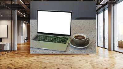 Laptop computer with blank white screen with coffee cup on table. Working business concept. Wall mural