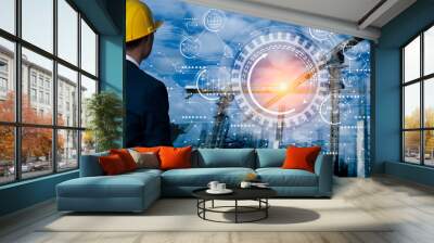 Future building construction engineering and technology project concept. double exposure graphic with engineer using digital tablet and smart industry and IOT software to control operation. Wall mural