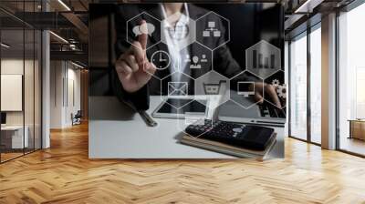 Hands of business woman working  on digital tablet computer with documents on office table. Double exposure 
digital marketing concept. Wall mural