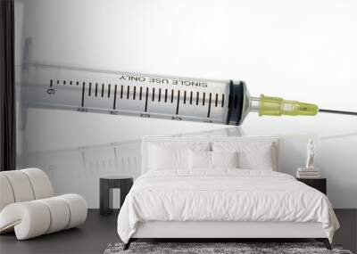 empty syringe for injection on white background Wall mural