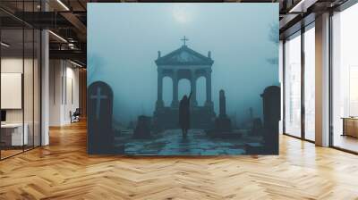 A person dressed in dark clothing wanders through a misty graveyard, passing by graves and an ornate mausoleum in the gloomy light Wall mural