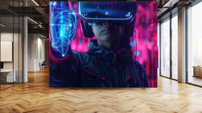 A woman in VR headset uses digital interface in neon-lit environment, reaching towards blue graphic Wall mural