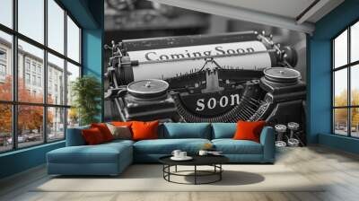 Coming soon. Classic black and white typewriter on desk, showcasing its keys and intricate mechanics Wall mural