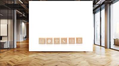 Wooden blocks on table showing phone, email, address and live chat icons. Contact us about customer service center connectivity concept. Internet communication via website Wall mural