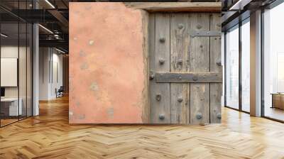 Rustic Wooden Door Against Pink Wall Background Wall mural