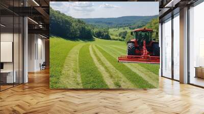 Tractor Mowing Green Field Under Blue Sky Wall mural