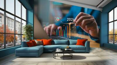 Businessman investor analyzes profitability of working companies with digital augmented reality graphics, positive indicators in 2024, businessman calculates financial data for long-term investments. Wall mural