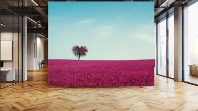 Abstract field with heart shape tree under blue sky. Beauty nature. Valentine concept background Wall mural