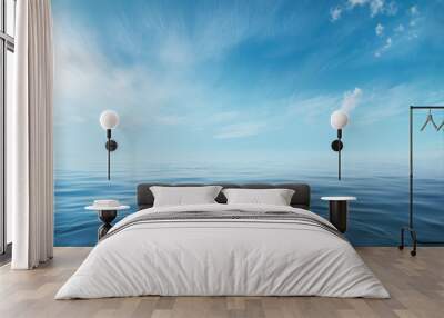 Blue sea or ocean with sunny and cloudy sky Wall mural