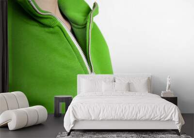 Sweatshirt design and fashion concept - young woman in green sweatshirt with zipper. Wall mural