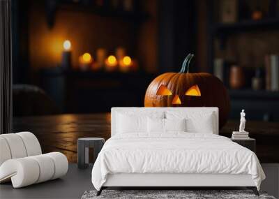 Carved Halloween pumpkin above table with blurred room house interior background. Wall mural