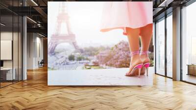 beautiful fashion woman on high heels near eiffel tower in paris, france Wall mural