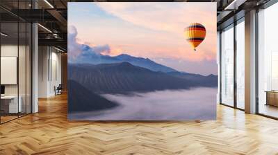 beautiful inspirational landscape with hot air balloon flying in the sky, travel destination Wall mural