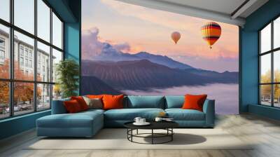 beautiful inspirational sunrise landscape with hot air balloons in sky, nature travel destination, scenic view banner background Wall mural