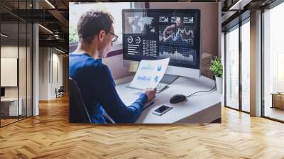 entrepreneur reading financial report on dashboard, fintech and audit concept, monitoring revenue statement of performance of the company Wall mural