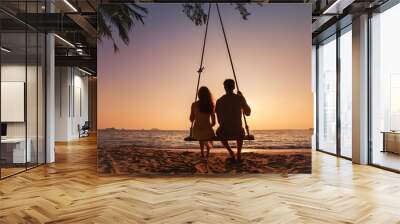 honeymoon travel, silhouette of romantic couple on sunset  beach, tropical holidays near the sea, man and woman together on vacation Wall mural