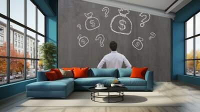 investment concept, money for startup, fundraising, business man looking at dollar bags drawn by chalk Wall mural