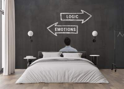 Logic vs emotions, logical choice versus emotional, business man looking at arrows Wall mural