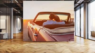 luxury, romantic couple in vintage classic cabriolet car at sunset Wall mural