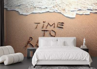 time to relax, concept written on sandy beach Wall mural