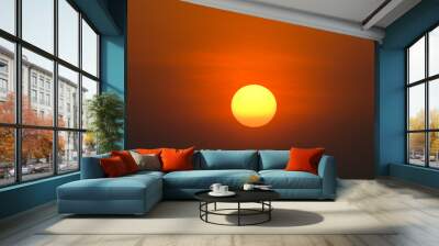 big orange sun on sunset background Wall mural