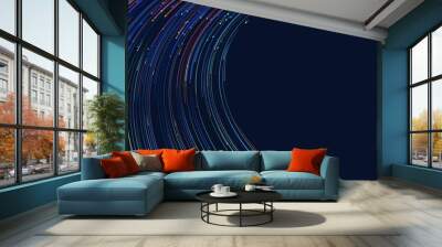 Abstract colorful circular lines on dark blue background Wall mural