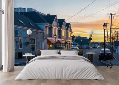 Beautiful sunset over popular street in Cape Town Massachusetts, beach town harbor  Wall mural