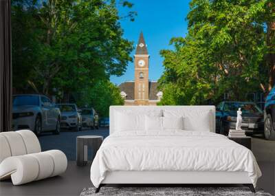 Historic Washington County Courthouse building in Fayetteville Arkansas, college ave, street view traffic, sunny summer day view Wall mural