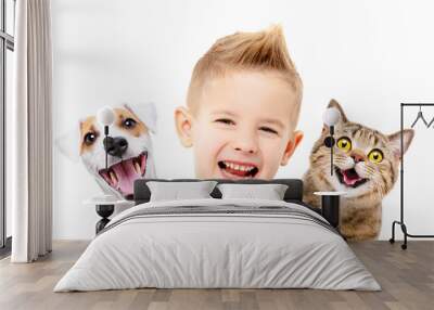 Portrait of happy smiling boy with a dog Jack Russell Terrier and a cat Scottish Straight, closeup, isolated on white background Wall mural