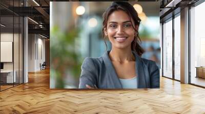 A young woman with smiling face in office Wall mural