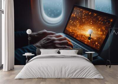 closeup hand of a business man using a laptop in flight Wall mural