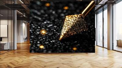   A close-up of a golden object on a dark background with tiny beams of light illuminating it Wall mural