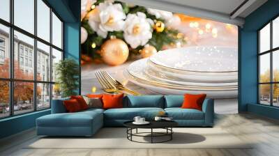   A white plate stack sits atop a table beside a vase brimming with white and gold blossoms Wall mural