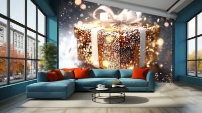   An image of a luxurious gift box adorned in gold and white, resting on a silver surface and topped with a pristine white ribbon and bow The scene is completed Wall mural